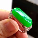 Icy green jadeite ring inlaid with gold and diamonds